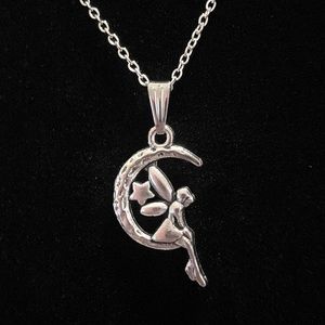 Fairy Necklace Sitting On Moon
